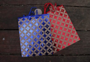 small presents bags with ancient geometric patterns