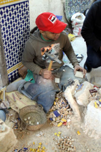 tile cutter, Fes, Morocco, December 2018Zellige