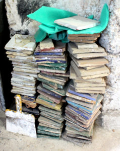 Piles of tiles waiting to be cut into Zellige