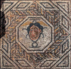 Medusa at the entrance of the Triclinium