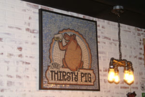 The THirsty Pig mosaic.