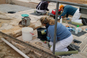 Archaeologists are repairing the mosaics of the house of the Planetarium