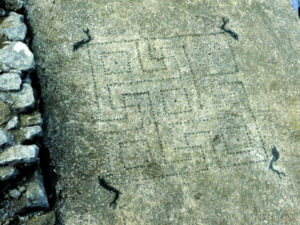 Opus signinum floor, Svastika & Dolphins, Uzes, France