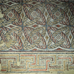 Plassac's mosaic style in evolving between the earlier and later styles of the Aquitaine school of mosaics. 