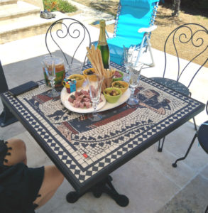 Dionysoso & Ariadne mosaic table ready for the drinks