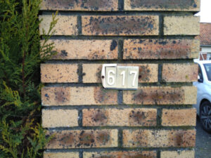 The original, decrepit & pitiful house number